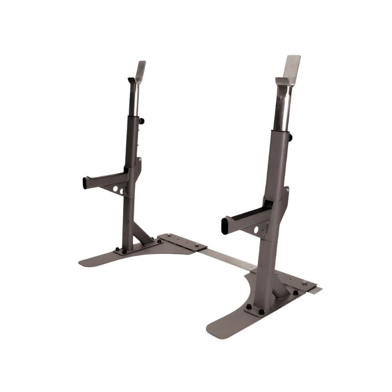 The JORDAN Premium Heavy Duty Squat Stand by Jordan features adjustable metal stands with a connecting base, support arms, and footplates for stability—ideal for holding a barbell in your home or garage gym.
