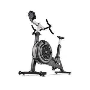 A black and silver air bike exercise machine with a large fan wheel, adjustable seat, handlebars, and a digital display, shown on a white background.