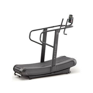 Curved black treadmill with a digital display and handlebars, designed for manual operation and running or walking exercise, set against a plain white background.