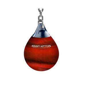 A red and black HEAVY HITTERS Aqua Punch Bag by Heavy Hitters hangs from a metal chain against a white background, highlighting its reduced impact design and water-filled construction.