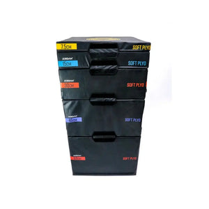 The Jordan JORDAN Soft Plyo Boxes are stackable foam plyometric training platforms in black, available in 7.5cm to 60cm heights with colored labels—ideal for fitness exercises and plyometric workouts.