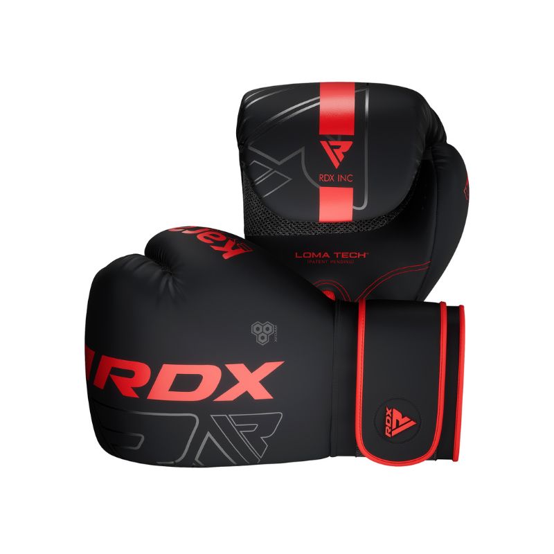 A pair of black RDX boxing gloves with red accents and branding, featuring a modern design and secure wrist straps, positioned to show both the front and side views.