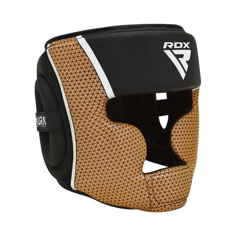 The RDX - Aura Plus T17 Head Guard features black and gold geometric patterns, padded sides, open face, and reinforced stitching for superior impact protection in combat sports.