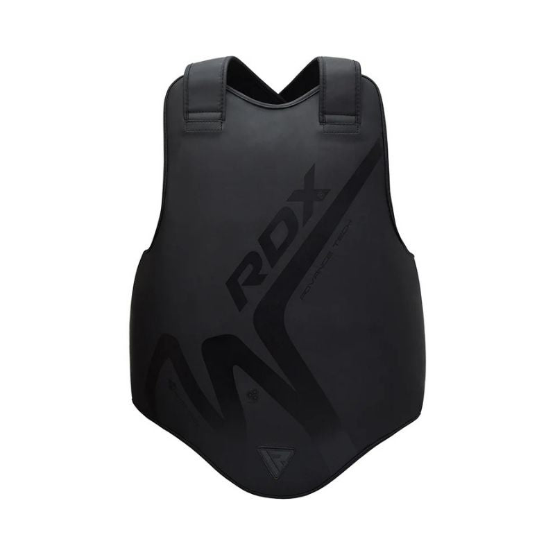 RDX - Noir T-15 Body Protector with adjustable shoulder straps offers superior body protection for martial arts or boxing. “RDX” is printed diagonally on this smooth, contoured chest guard.