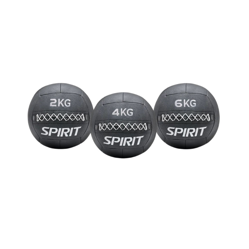 Three Spirit branded wall balls in different weights on a white background
