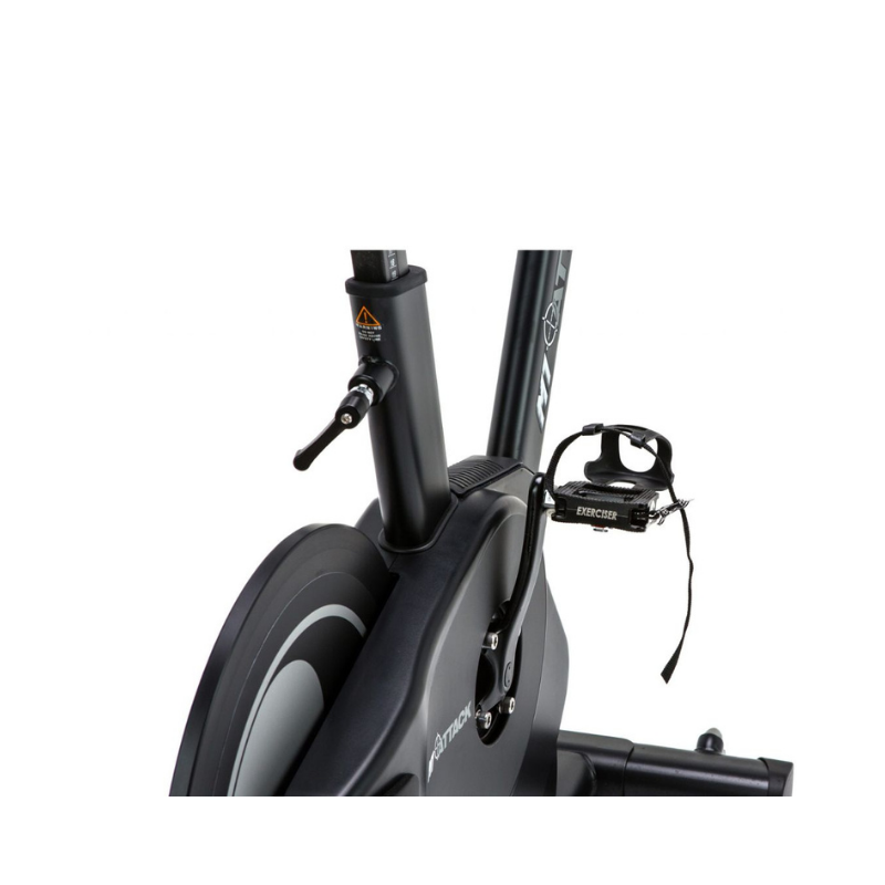The Attack Fitness M1 Magnetic Studio Bike by Attack Fitness is a black belt-driven indoor cycle with console, featuring an adjustable seat, handlebars, and large flywheel—ideal for indoor cycling workouts against a white background.