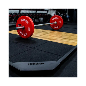 The Jordan UK-Made Weightlifting Platform – Heavy-Duty Strength Training Base features a central wooden section and black rubberized edges, ideal for gym or fitness use, and is shown on a white background.