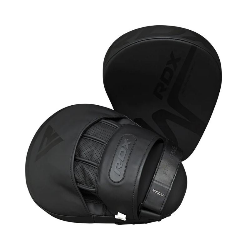 A pair of black RDX - Noir T-15 Focus Pads for boxing or martial arts, featuring ConvEX Skin Combat Leather, mesh ventilation, and a secure wrist strap for enhanced protection and comfort.