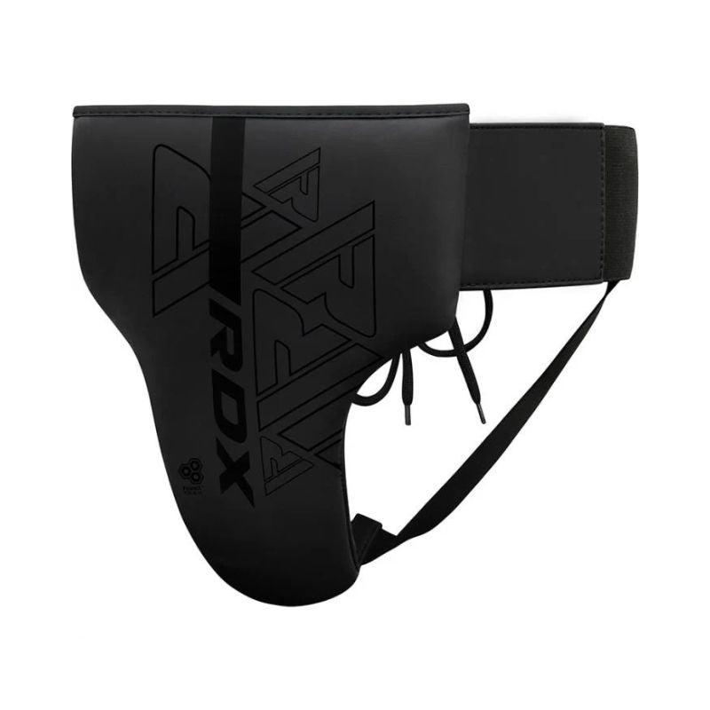 The RDX - Kara F6 Groin Guard is a black boxing groin protector with an adjustable waistband and support straps, ideal for reliable sports or martial arts protection.