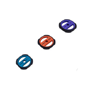 The Jordan JORDAN Ignite Pump X™ Urethane Studio Barbell Set features colored blue, red, and purple weight plates and rests on a white background—ideal for pump-style workouts.