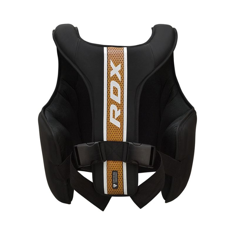 The RDX - Aura Plus T17 Chest Guard features thick padding, adjustable straps, and a central gold strip with the RDX logo. Perfect protective vest for martial arts or boxing training.