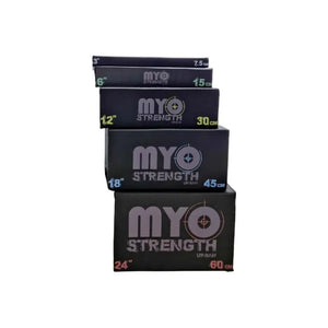 Five black MYO Strength Soft Plyometric Platform Boxes (7.5–60cm) are stacked by size, each labeled in cm/inch, perfect for jump training. This is the stackable 5-piece kit by MYO Strength.