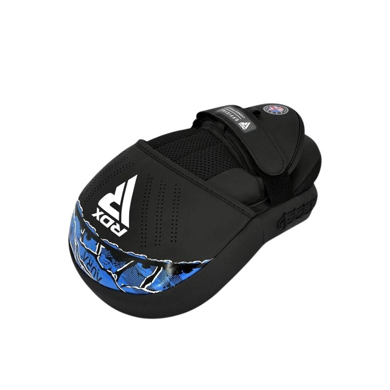 The RDX - Aura Plus F17 Focus Pads feature a black and blue design, high-density foam, curved shape, mesh ventilation, and a white RDX logo—perfect for enhancing punch accuracy.