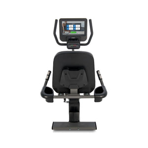Recumbent bike with digital display on a white background