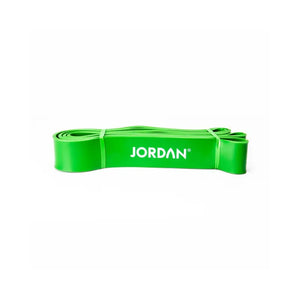 A flat green JORDAN Power Band, coiled on a white background, features the brand name in white—perfect for strength, speed, and mobility training or pull-up assistance.