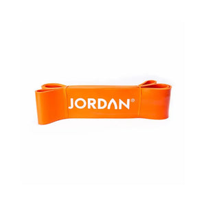 A flat orange JORDAN Power Band, coiled on a white background, features the brand name in white—perfect for strength, speed, and mobility training or pull-up assistance.