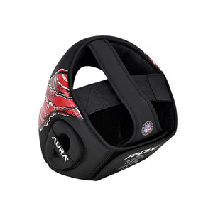 Black martial arts headgear with red and black graphic patterns on the side, featuring white 'AURA' branding on the ear cup and a small circular logo on the side.