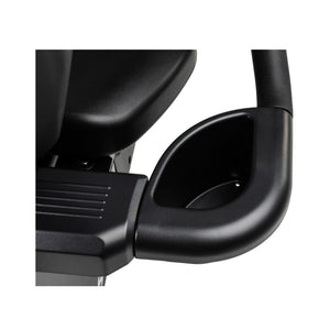 Close-up of a black exercise bike seat and handlebar on a white background