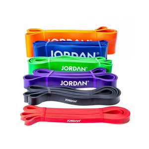 A set of coloured JORDAN Power Band, coiled on a white background, features the brand name in white—perfect for strength, speed, and mobility training or pull-up assistance.