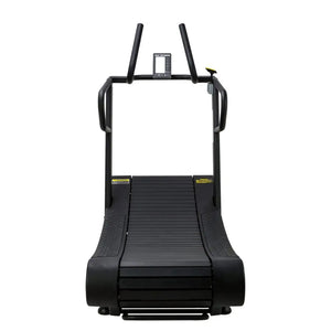 The Attack Fitness Run Attack Self-Powered Curved Treadmill, designed for HIIT, endurance, and sprint training, features a black frame and handlebars and is displayed against a plain white background.