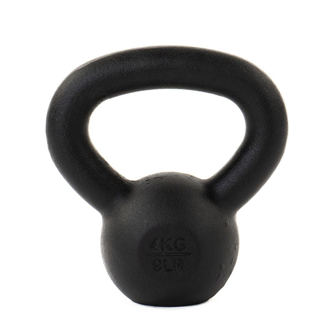 The ATTACK Fitness Cast Iron Kettlebell, weighing 4 kg/9 lbs, is displayed on a white background. Its ergonomic handle ensures a comfortable grip, perfect for functional strength training.