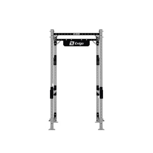 The Exigo X70 Compact Power Rack by Exigo stands on a white background, featuring sturdy vertical supports, multiple adjustment holes, and an integrated pull-up bar.