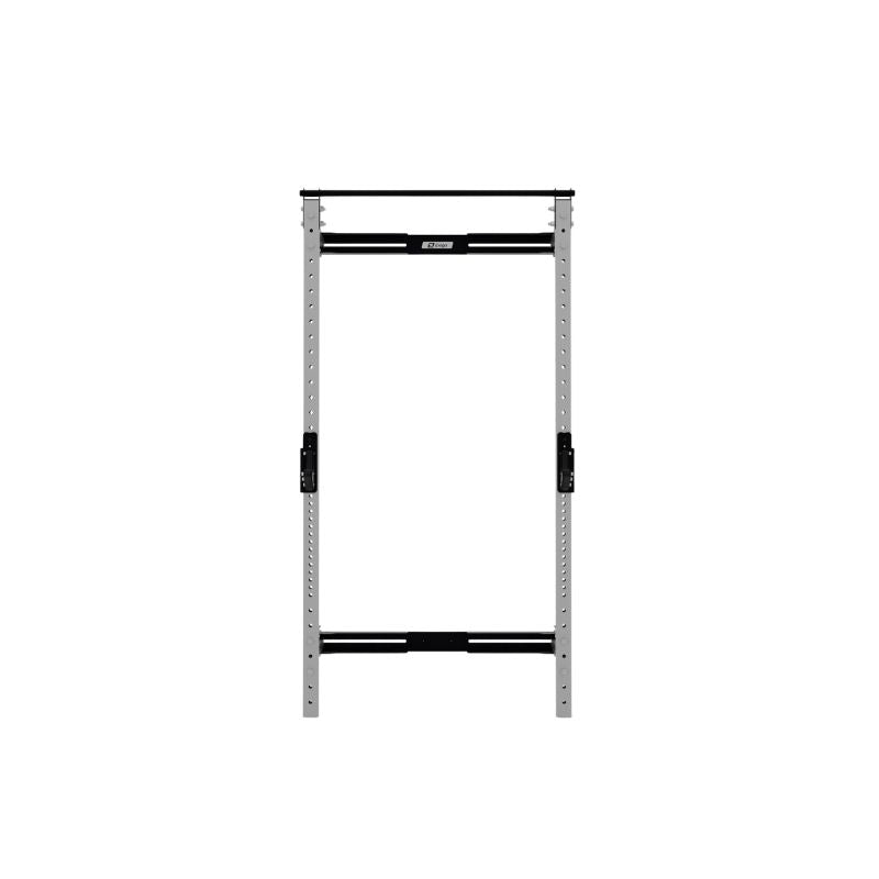 The Exigo X70 Folding Rack by Exigo is a freestanding metal squat rack with two vertical posts, adjustable safety bars, and horizontal supports—offering a space-saving weightlifting and strength training solution for your home gym.