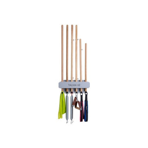 The Hegren HEGREN Pilates Stick Wall Rack is a wall-mounted wooden holder with six upright poles for vertical storage, designed like a Pilates Stick Wall Rack, ideal for hanging colorful dog leashes and collars.