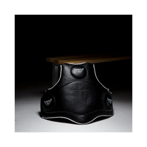 The HATTON BOXING Leather Boxing Body Protector by Hatton is a black, heavy-duty coach chest pad with padded sections and a logo, designed for superior protection and shock absorption during training.