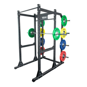 The Jordan JORDAN HELIX Power Rack (LTR) Weight Storage Horns Attachment (Pair) features a black, vertical metal design with multiple holes and four angled pegs for smart bumper plate or gym equipment storage.