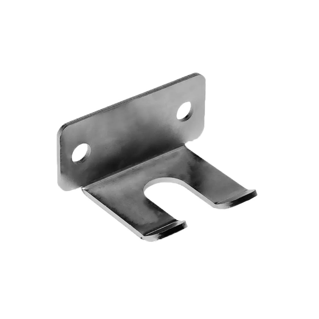 The JORDAN HELIX Bar Holder Attachment by Jordan is a metal bracket with two screw holes and a U-shaped slot for securing Olympic barbells or storage to surfaces. This individual attachment is shown against a white background.