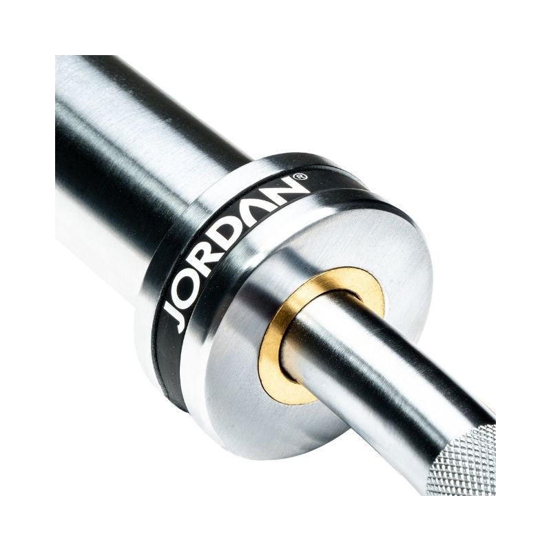 Close-up of the JORDAN Steel Series Super Curl Bar – a 1200mm Olympic barbell with knurled ergonomic grips and "Jordan" branding, designed for effective biceps and triceps workouts.