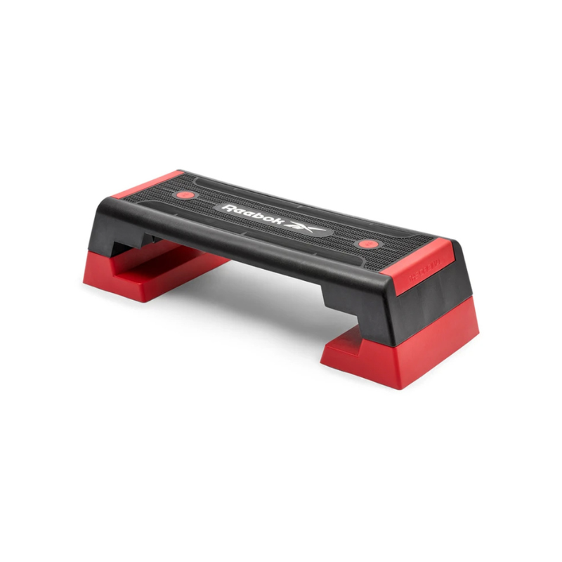 The Jordan Reebok Step – Adjustable Aerobic Platform (Latest Model) features a black and red design with a textured, non-slip surface for effective fitness and exercise routines.