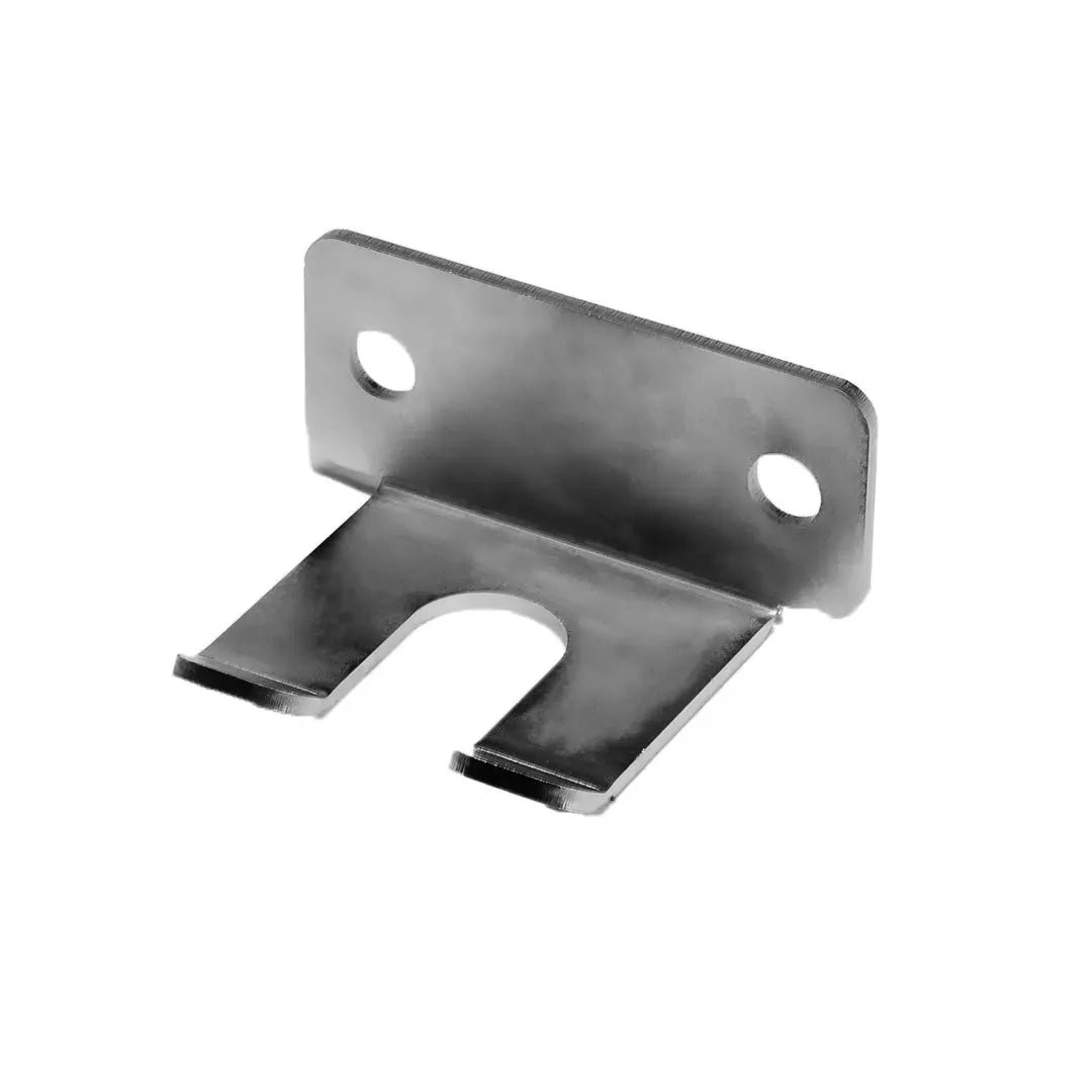 The JORDAN HELIX Bar Holder Attachment by Jordan is a metal bracket with two screw holes and a U-shaped slot for securing Olympic barbells or storage to surfaces. This individual attachment is shown against a white background.