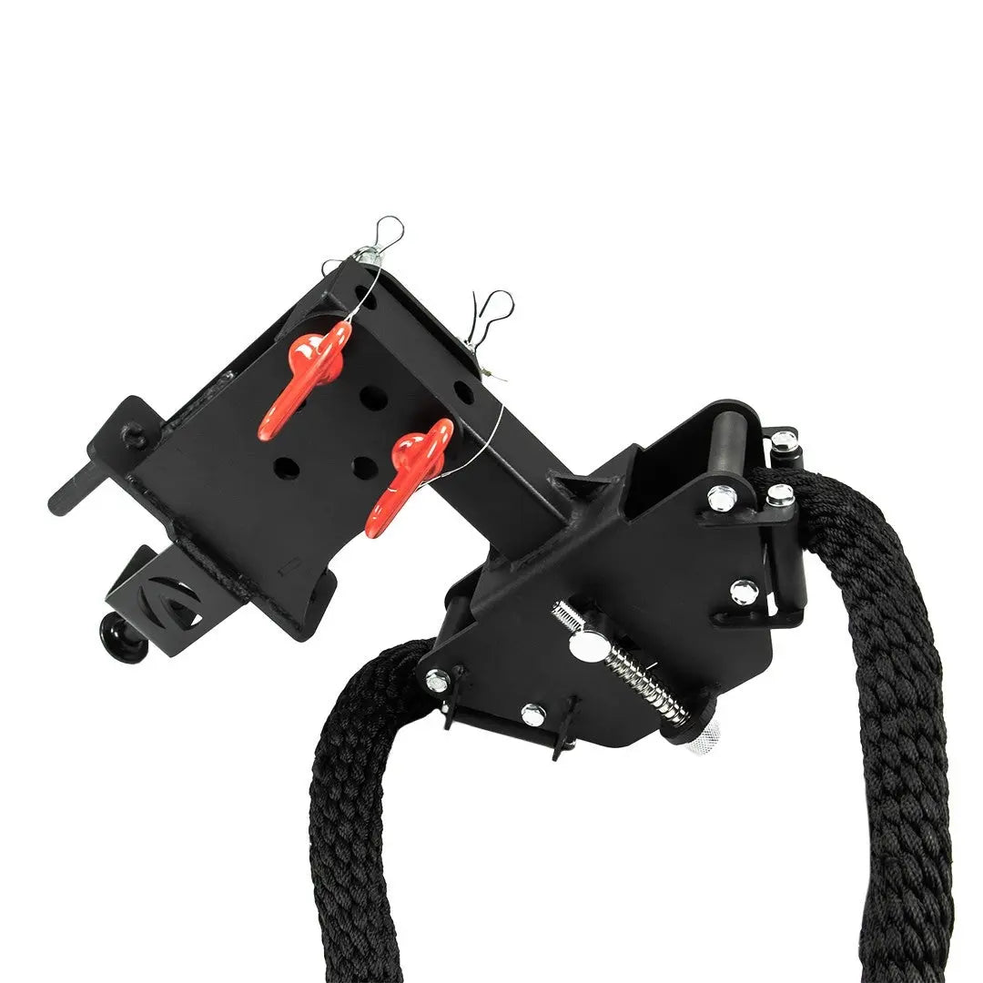 The JORDAN HELIX Rope Attachment by Jordan is an adjustable, rack-mounted rope trainer with two red handles and thick black ropes, designed for functional training and secure rope workouts.