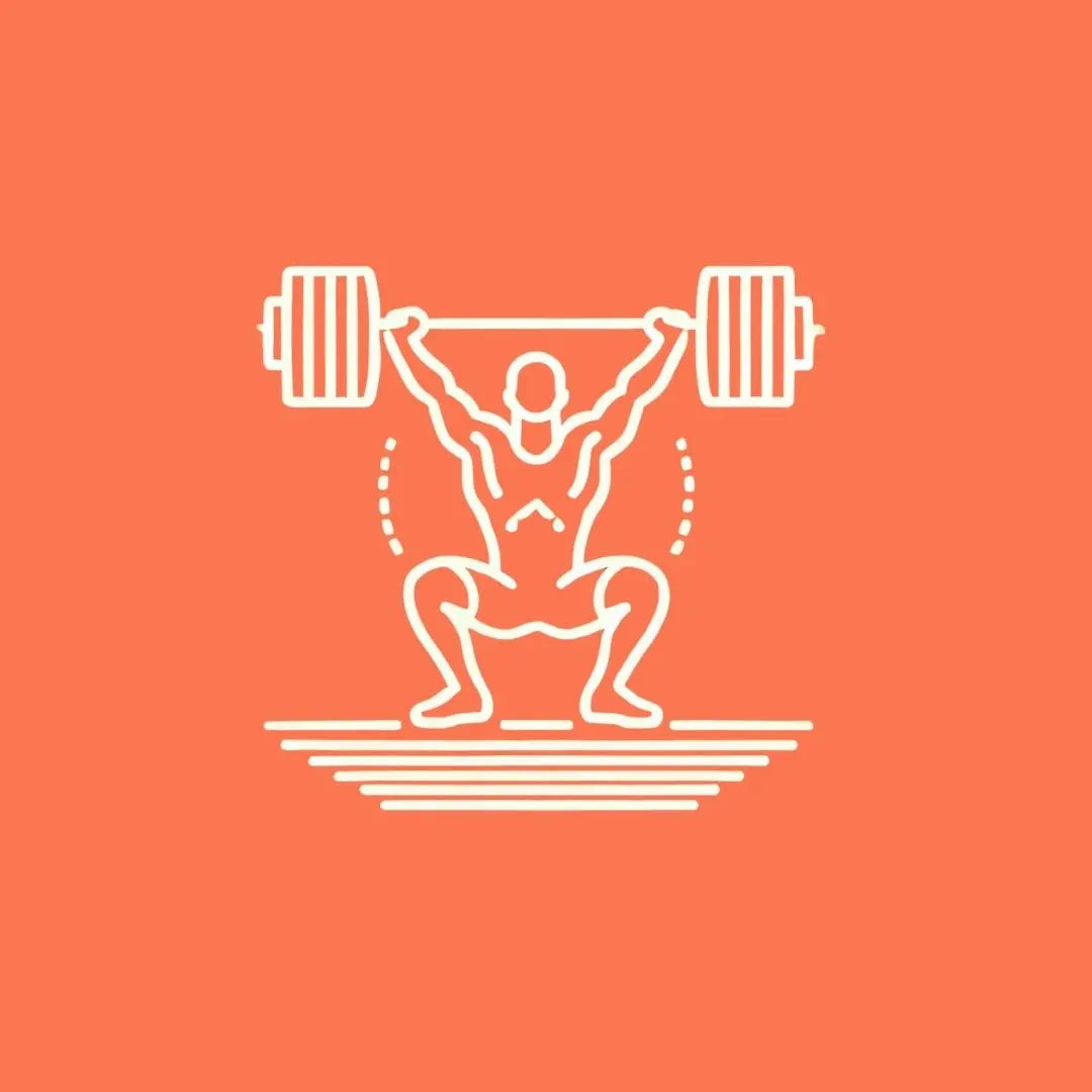 A person preparing to lift a barbell, their hands dusted with chalk. The gym floor and weights are visible, creating an energetic atmosphere focused on strength training.