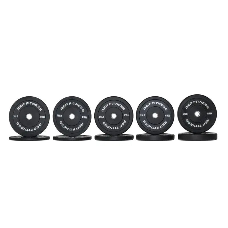 Five sets of black REP FITNESS weight plates arranged in a row against a white background, each set consisting of a larger and a smaller plate.