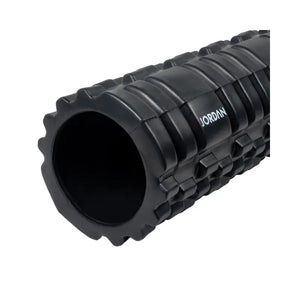 The Jordan Medium-Density Massage Roller – Everyday Foam Roller features a textured black, grid-like surface with Jordan printed in white, perfect for daily recovery and muscle relief. Pictured horizontally on a white background.
