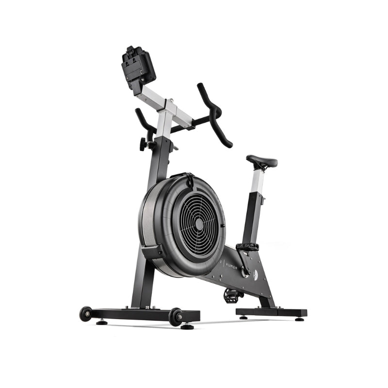 A black and silver air bike exercise machine with a large fan wheel, adjustable seat, handlebars, and a digital display, shown on a white background.