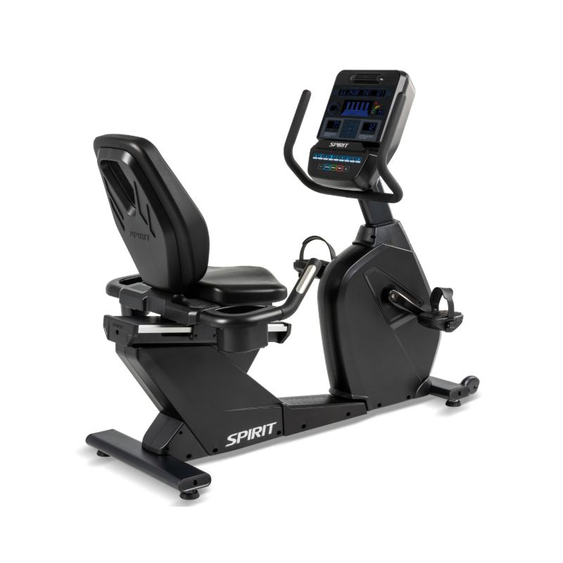 Black exercise bike with digital display on a white background