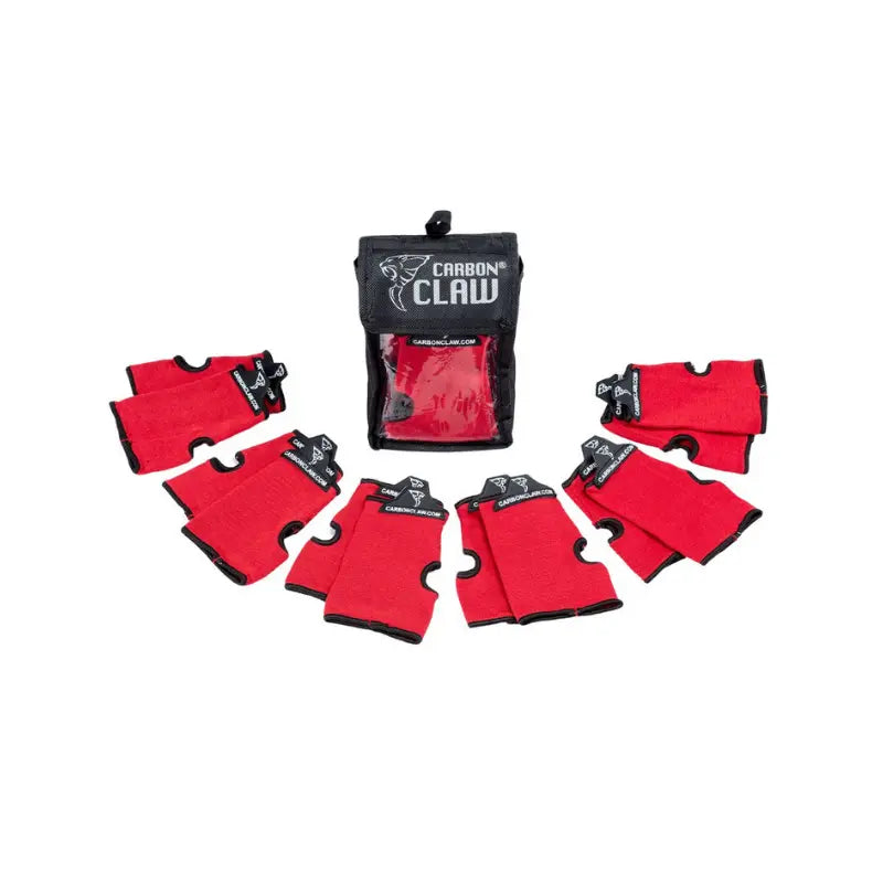 The Carbon Claw Aero AX-5 Inner Mitts x 6 set includes six pairs of red mitts with black trim and labels, arranged around a branded carry pouch—perfect for keeping your inner mitts organized with your boxing gloves.