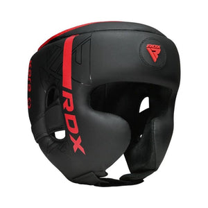 A black RDX boxing headguard with red accents, including a vertical stripe and the brand logo on the forehead, shown against a plain white background.