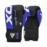 A pair of black and blue boxing gloves with white accents and branding, including "RDX" and "MG-2" on the wrist straps, displayed upright against a white background.
