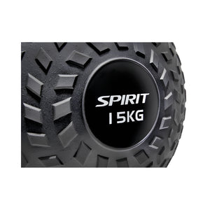 Close-up of a black exercise slam ball with a textured surface. The center label reads "SPIRIT 15KG" in white text, indicating the brand and weight of the ball.