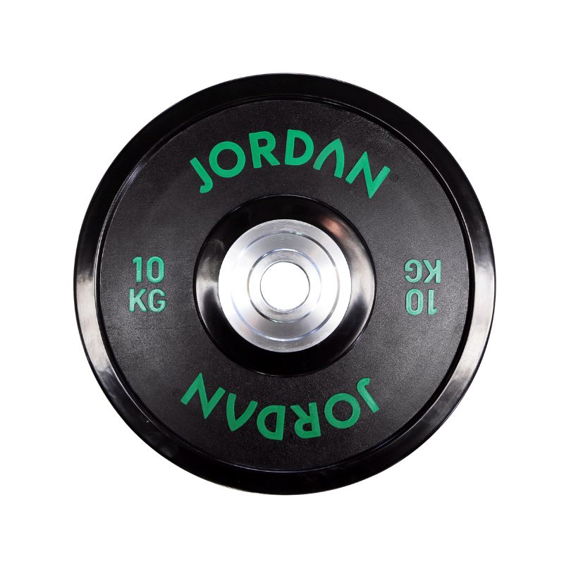 The JORDAN Urethane Olympic Competition Plate by Jordan is a black plate with green "JORDAN" lettering and "10 KG," featuring competition-grade accuracy and a silver center hole for barbell mounting.