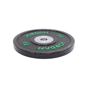 The JORDAN Urethane Olympic Competition Plate by Jordan is a black plate with green "JORDAN" lettering and "10 KG," featuring competition-grade accuracy and a silver centre hole for barbell mounting.