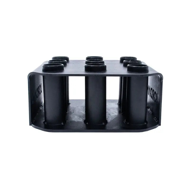 The JORDAN Olympic Bar Holder by Jordan is a black, rectangular rack with nine vertical slots for organizing Olympic bars upright, featuring the brand name cut out on the side.