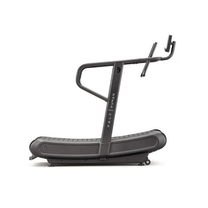 Side view of a black curved manual treadmill with the brand name "Half Human" on the frame, featuring a simple console and sturdy handlebars, set against a white background.
