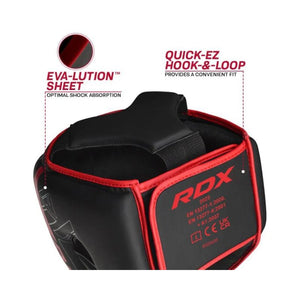 Black and red RDX MMA headgear with text callouts highlighting EVA-LUTION sheet shock absorption and Quick-EZ hook-and-loop fit, on a white background.