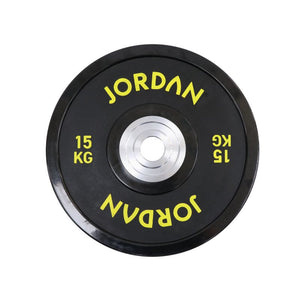 The JORDAN Urethane Olympic Competition Plate by Jordan is a black plate with yellow "JORDAN" lettering and "15 KG," featuring competition-grade accuracy and a silver centre hole for barbell mounting.